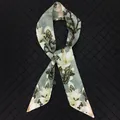 Elegant bean green silk scarf with white magnolia floral print on black quilted background - Grey Green Magnolia (C140)