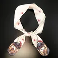 Detail shot of white twilly scarf featuring cute Shiba Inu and cherry blossom prints - Cream Shiba Sakura (C141-8)
