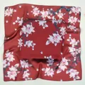 Deep red satin square scarf with white magnolia floral print and elegant silky sheen - Burgundy