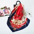 Luxurious satin square scarf with vintage royal chain pattern draped on a black handbag - 90cmx90cm / Navy Blue