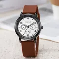 KAQINUO men's quartz watch featuring brown leather strap, black case, and white dial - Coffee