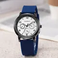 Minimalist quartz wristwatch with a navy blue silicone strap and black metal case - Blue