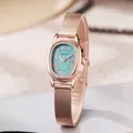 Elegant women's oval quartz watch with teal dial and rose gold mesh strap - Blue Dial