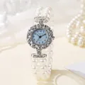 Elegant women's quartz watch with light blue dial and double-strand pearl bracelet - Blue