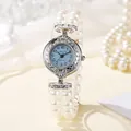 Elegante reloj de pulsera de perlas vintage con esfera azul y bisel de metal plateado - Esfera Azul