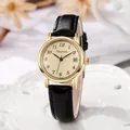 Detailed macro of gold quartz watch with black leather strap and calendar date display - Black Strap Yellow Dial
