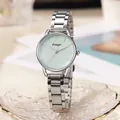 Detailed close-up of mint green dial quartz watch with silver stainless steel strap - Silver Band Blue Dial