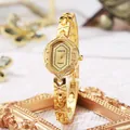 Vintage gold bracelet watch for women with octagonal dial and ornate metal strap - Gold Band Gold Dial