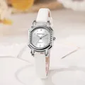Detail of elegant silver tonneau watch face with white crocodile embossed leather strap - Belt - White Belt With White Disc