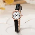 Reloj de cuarzo minimalista con caja de oro rosa, números romanos y correa de cuero negro - Negro