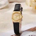 Vintage dameskwartshorloge met gouden ovale kast en zwarte leren band op champagne wijzerplaat - Riemstijl / Zwarte Band Gouden Kast Gouden Wijzerplaat