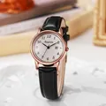 Detailed view of women's vintage quartz watch with rose gold case and leather strap - Black Band Gold Case White Dial