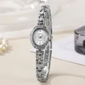 Vintage oval silver ladies bracelet watch with textured bezel and rhinestone hour markers - Silver Band White Dial