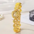 Elegante Damen Vintage Quarzuhr in Gold mit geschnitztem Kettenband und ovalem Blatt - Goldenes Stahlarmband Goldenes Zifferblatt