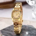 Montre ovale dorée pour femme avec chiffres romains et bracelet en acier poli - Bracelet Doré Boîtier Doré Cadran Doré