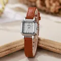 Detail of silver octagonal quartz watch case with brown lychee leather strap texture - Brown Strap Silver Case White Dial