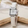 Detail of silver octagonal square watch with white leather strap and minimalist dial - White Strap Silver Case White Dial