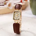 Vintage rechteckige Damenuhr in Gold mit braunem Lederarmband und champagnerfarbenem Zifferblatt - Braun