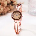 Elegant rose gold women's quartz watch with hollow bracelet and roman numeral dial - Coffee Gold/Coffee Dial
