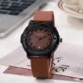 Fashionable quartz watch with brown silicone strap and date window on a lifestyle background - Coffee