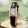 Macro shot of vintage rectangular rose gold watch with roman numerals and black leather strap - Black Strap - Rose Gold Case White Dial