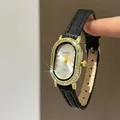 Elegant vintage ovaal kwartshorloge met gouden diamanten bezel en zwart lederen band - Index-Zwarte Band Witte Wijzerplaat