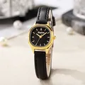 Elegant women's quartz watch with black tonneau dial and gold case on leather strap - Black Strap Gold Case Black Dial