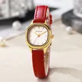 Detailed shot of a vintage women's watch with red leather strap and gold rectangular case - Red Strap Gold Case White Dial