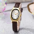 Vintage Quarz-Damenuhr mit goldenem Ovalgehäuse, Silberzifferblatt und Lederarmband - Kaffeeband Goldgehäuse Weißes Zifferblatt