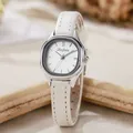 Detail of silver tonneau quartz watch with white leather strap on a minimalist background - White Strap Silver Case White Dial