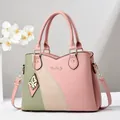 Elegante borsa a mano tricolore rosa e beige con tracolla e ciondolo a farfalla trendy - Rosa