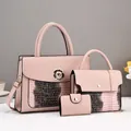 Detailed view of pink PU leather handbag set with snakeskin texture and metal floral clasp - Pink Flower Style