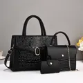 Three-piece black PU leather handbag set featuring chic crocodile pattern and gold accents - Black Circle Style