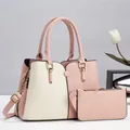 Fashionable two-piece contrast color leather handbag set with shoulder strap and gold hardware - Pink