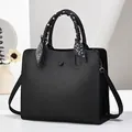 Minimalist black lychee leather tote bag with decorative silk scarf on handles - Black