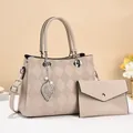 Elegant beige quilted tote bag set with leaf charm and matching envelope clutch purse - Khaki