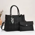 Conjunto de bolso de mano acolchado negro y cartera de mano con colgante de hoja plata - Negro