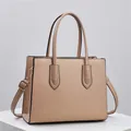 Cross-body tote bag in beige Saffiano leather with golden hardware and top handles - Khaki
