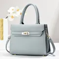 Elegant light blue-grey lychee grain leather tote bag with gold metal hardware - 28cm x 11cm x 22cm / Blue