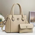 Elegant beige pebbled faux leather tote bag and matching wallet with metal K logo - Apricot