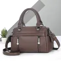 Deep brown pebble leather handbag with twin zip detail and adjustable shoulder strap - Coffee