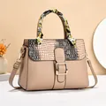 Fashionable beige faux leather handbag with crocodile pattern flap and silk scarf handle - Khaki