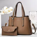 Dettaglio del set borsa tote marrone caramello e pochette con finiture argentate - Cachi scuro