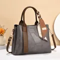 Grey geometric patchwork handbag with brown handles and decorative silk scarf detail - Length 30 Width 12 Height 21 / Gray