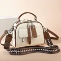 Fashionable cream PU leather tote bag with brown trim and wide patterned shoulder strap - Off-white