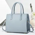 Light blue tote bag with vertical stripes, matte PU leather and detachable shoulder strap - Blue
