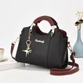 Elegante bolso bandolera negro y burdeos con colgante de estrella en ángulo de 45° - Negro
