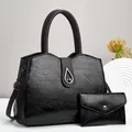 Detalle del conjunto de bolsos de cuero retro negro con cierre metálico de lágrima - Negro