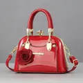 Mini red shell handbag in glossy patent leather with 3D rose and gold gemstone hardware - Glossy Red