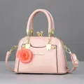 Pink patent leather shell mini bag with rose charm and crystal closure accents - Patent Leather Pink